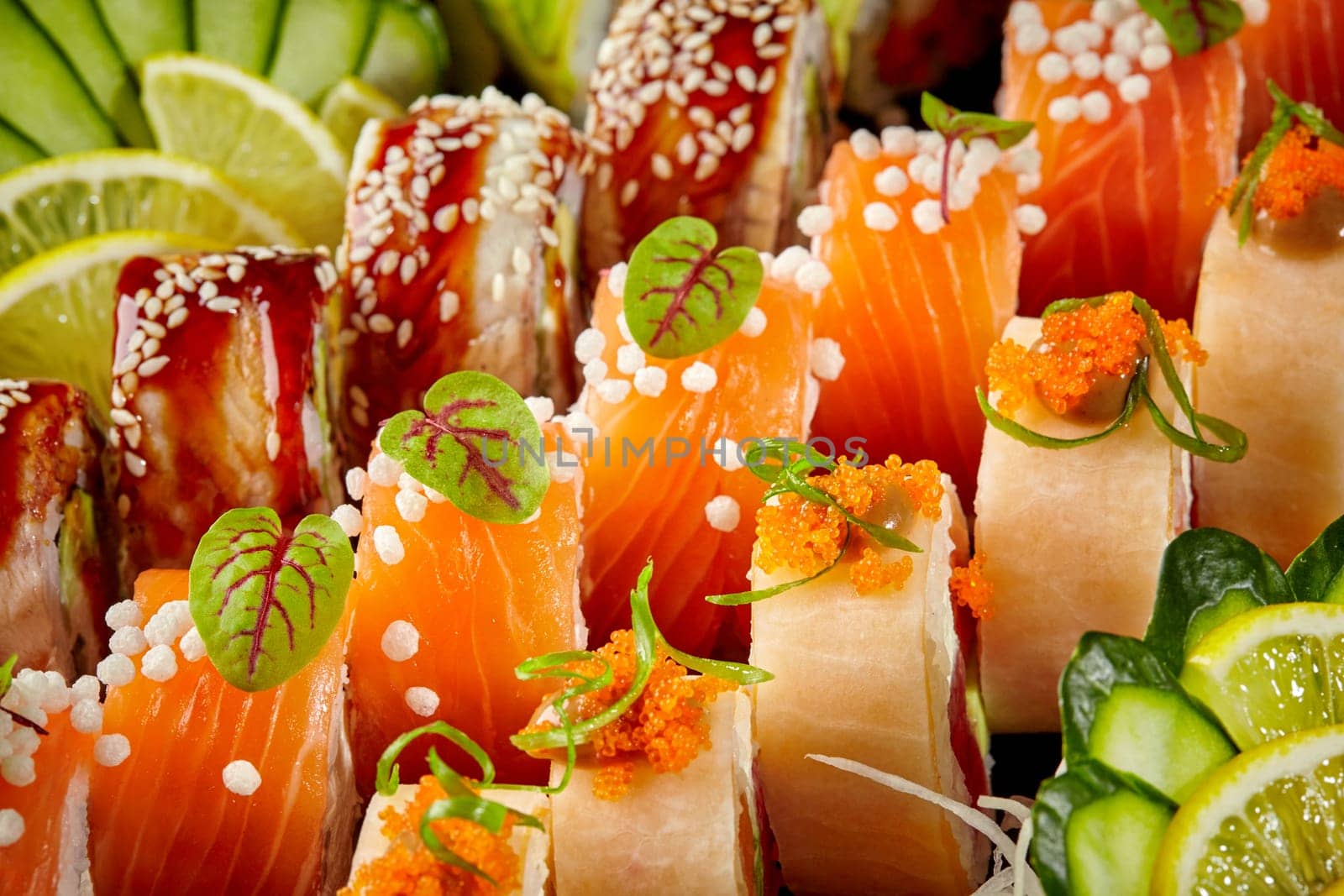 Assorted sushi rolls selection with fresh toppings by nazarovsergey