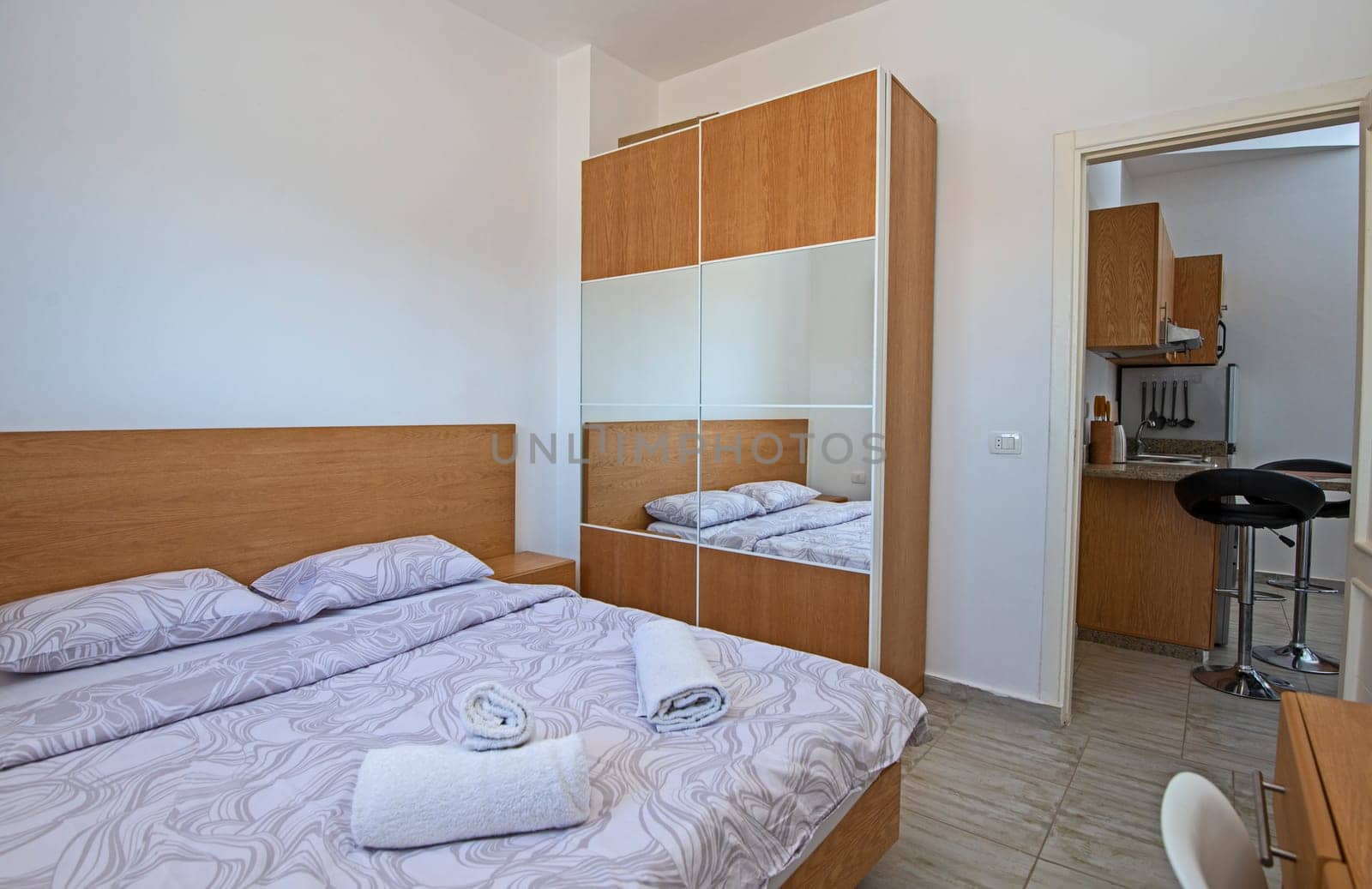 Interior design of bedroom in apartment with wardrobe by paulvinten