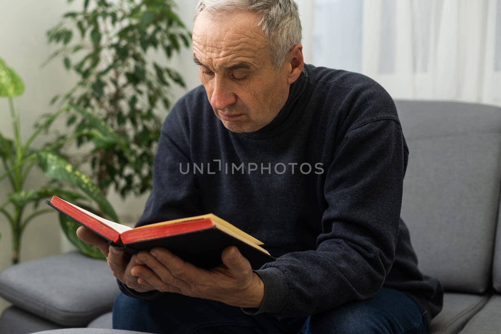 Hands of man praying to god with the bible, Concept of faith for god.