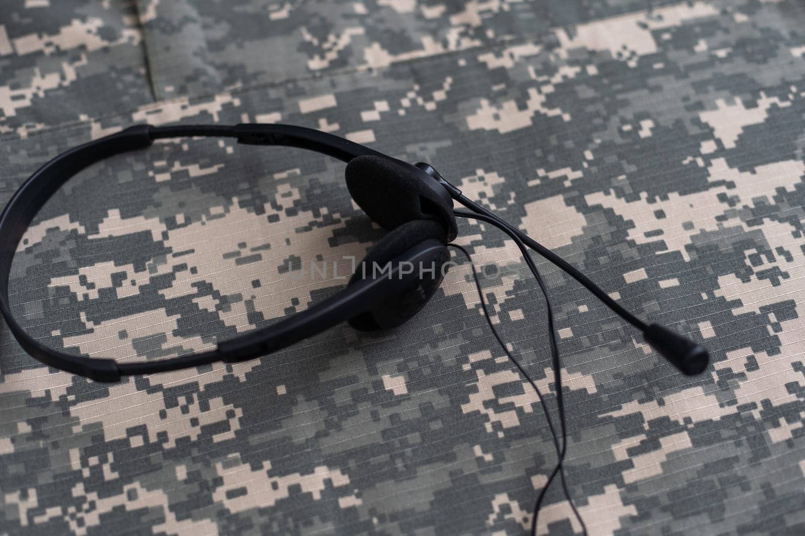 photo of military headphones isolated on background by Andelov13