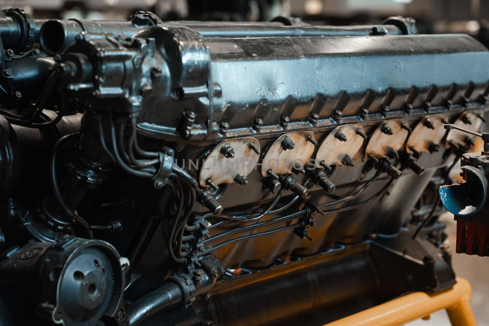 Old mechanic parts of airplane engine, closeup details by Popov