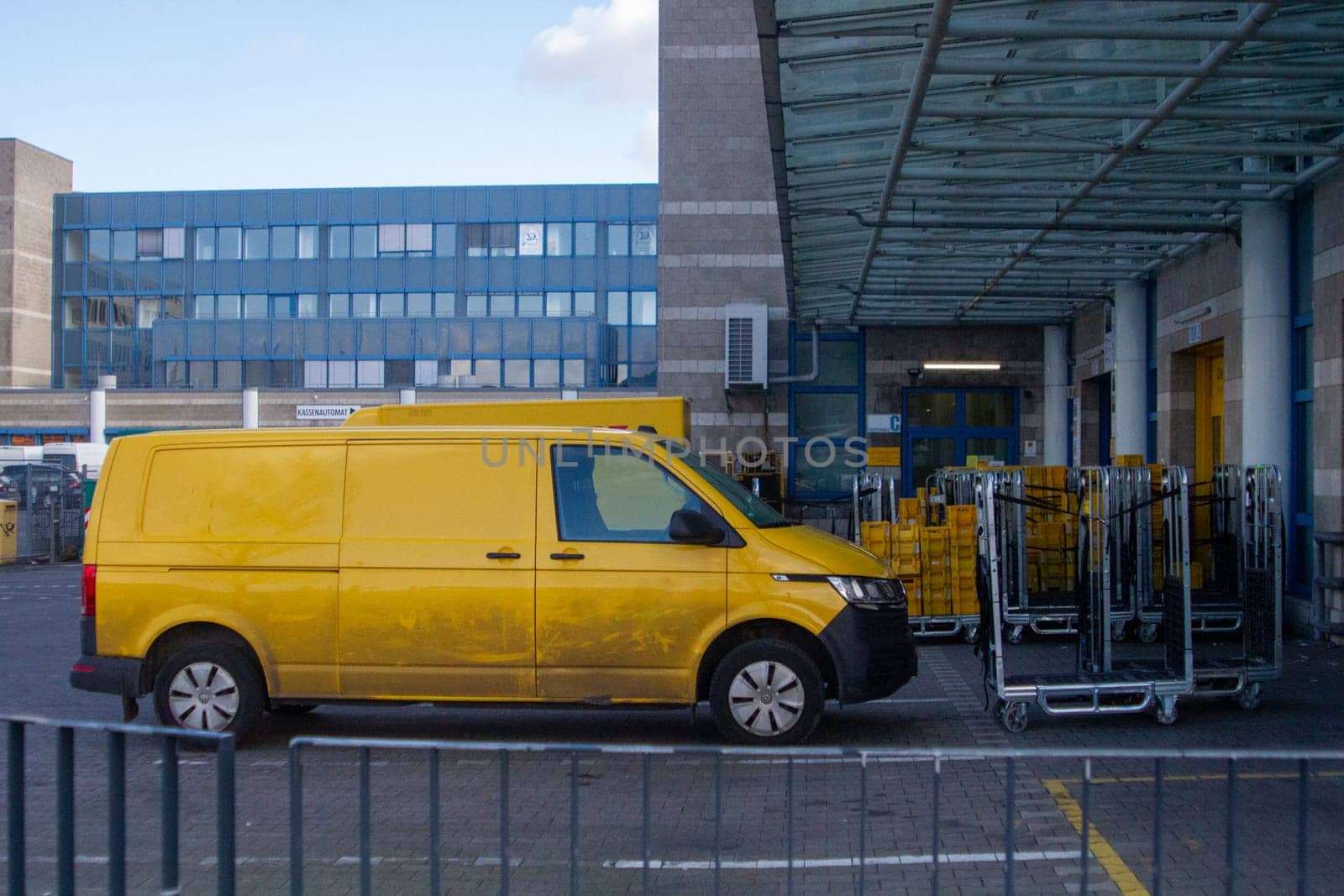 A yellow Postal Service van. High quality photo