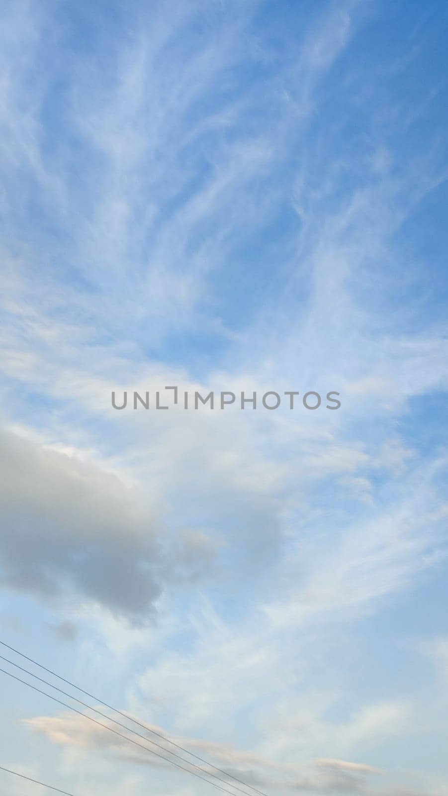Blue light sky nature white clouds whether background . High quality photo