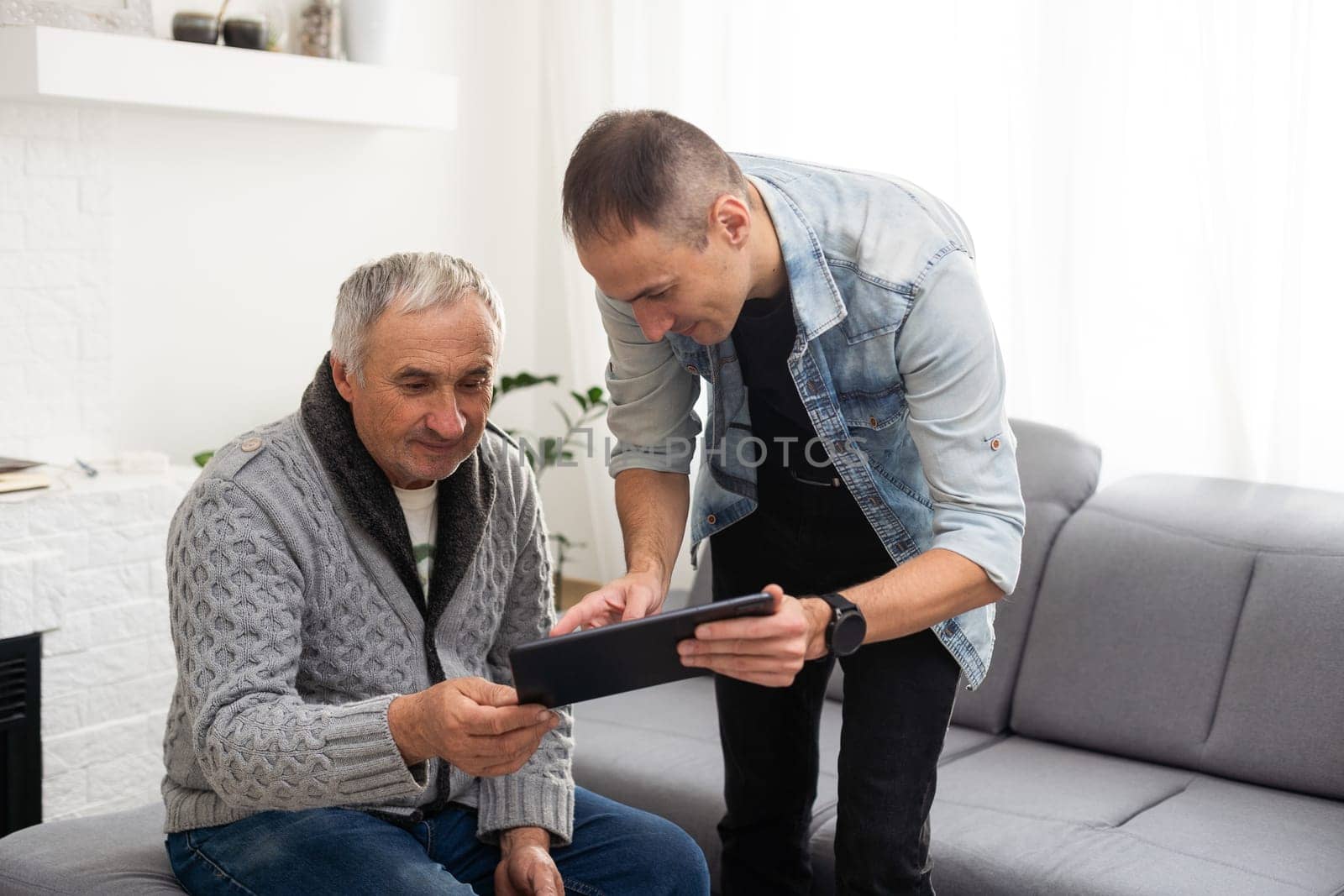 Elderly son takes care of ill father by Andelov13