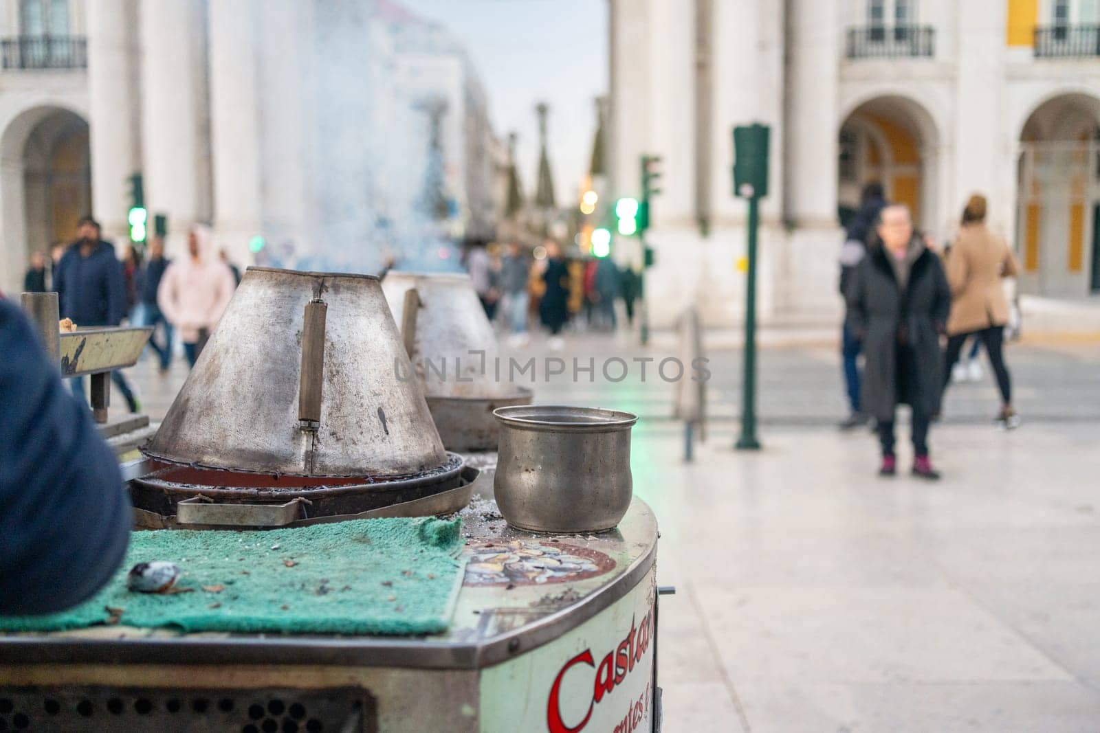 Roasted chestnuts sold on streets of historic center in Lisbon by andreonegin