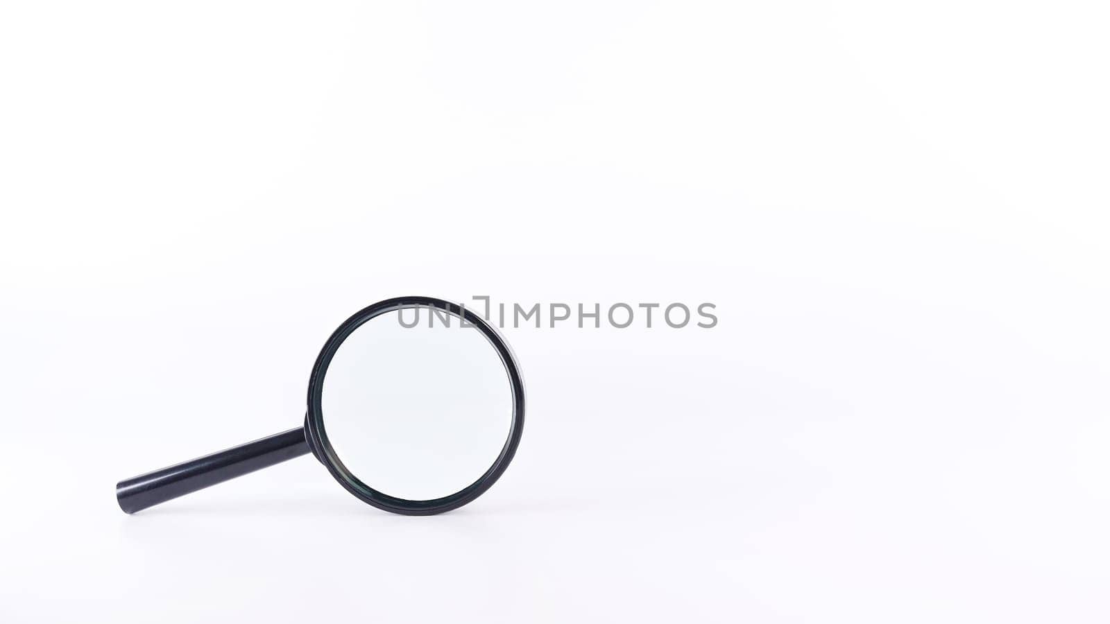 Black magnifying glass with handle on white background. Society questions, looking for answers