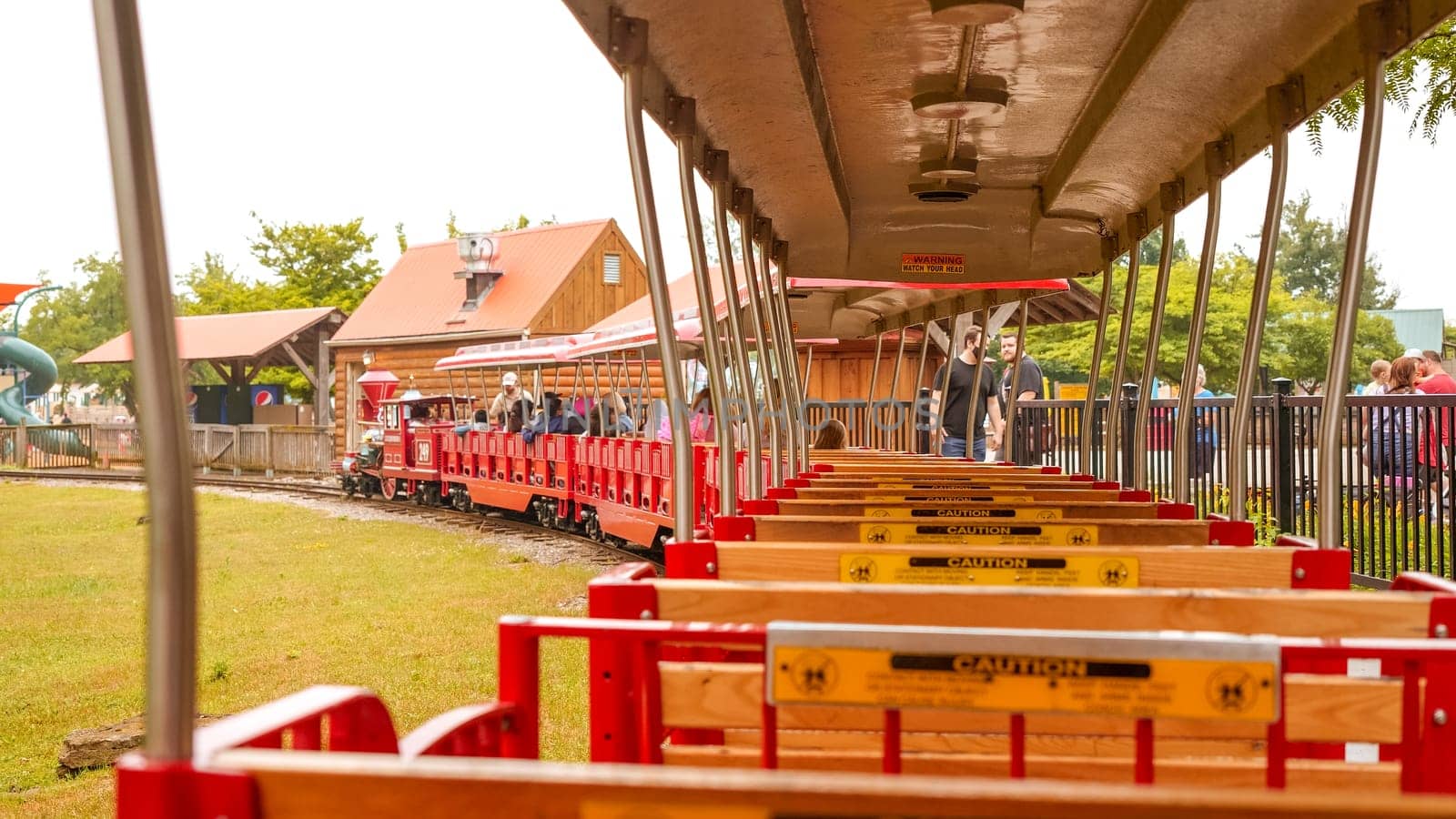 Steam locomotive and narrow gauge railroad at the Safari park on a sunny spring day. African Lion Safari park in Canada. Toronto ON Canada - 22.12.22.