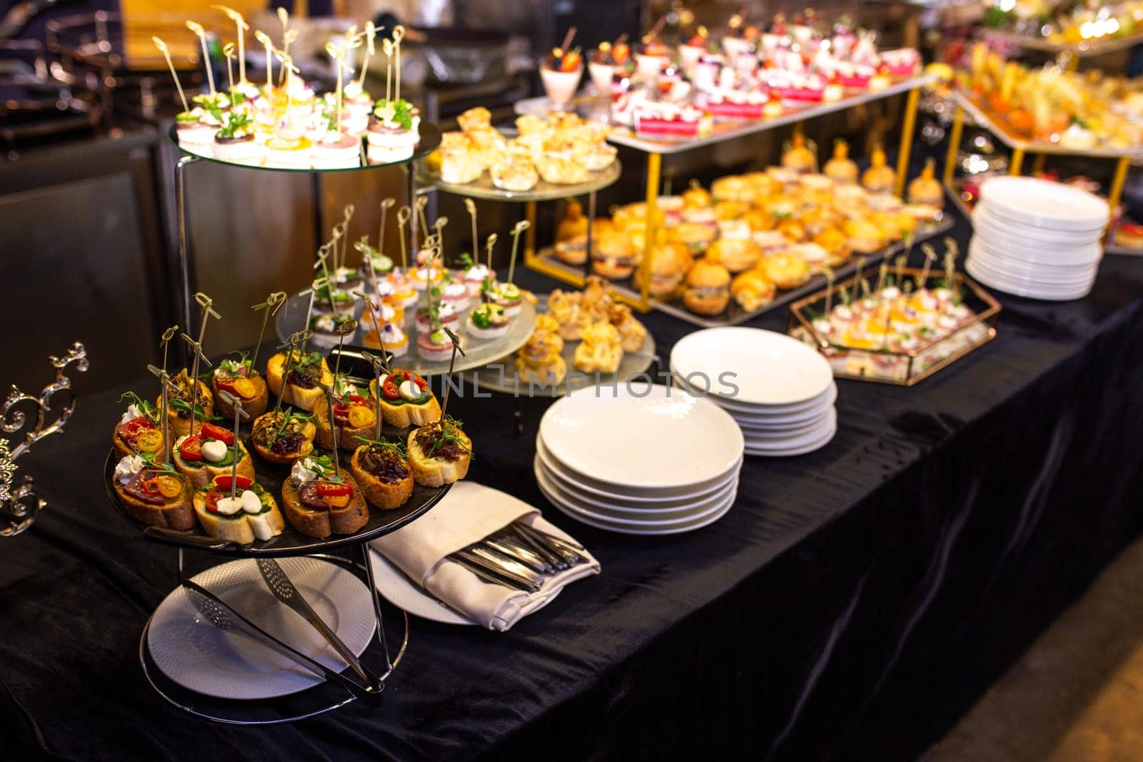 top view of snacks on a buffet table in an elite hotel.