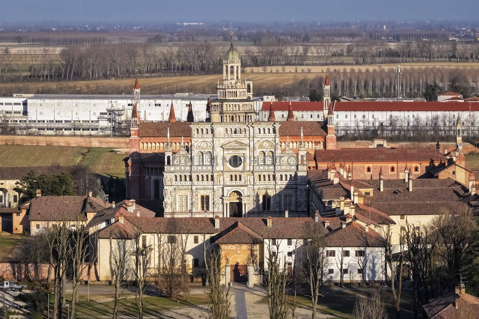 Drone shot of Certosa di Pavia cathedral a historical monumental complex that includes a monastery and a sanctuary. Pavia ,Italy.