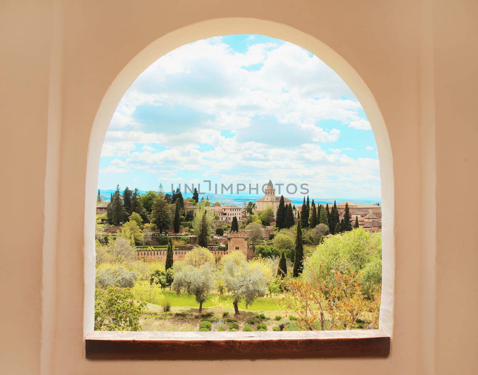Alhambra, Granada, Andalusia, Spain. Palace and fortress complex. View through window. by Rohappy