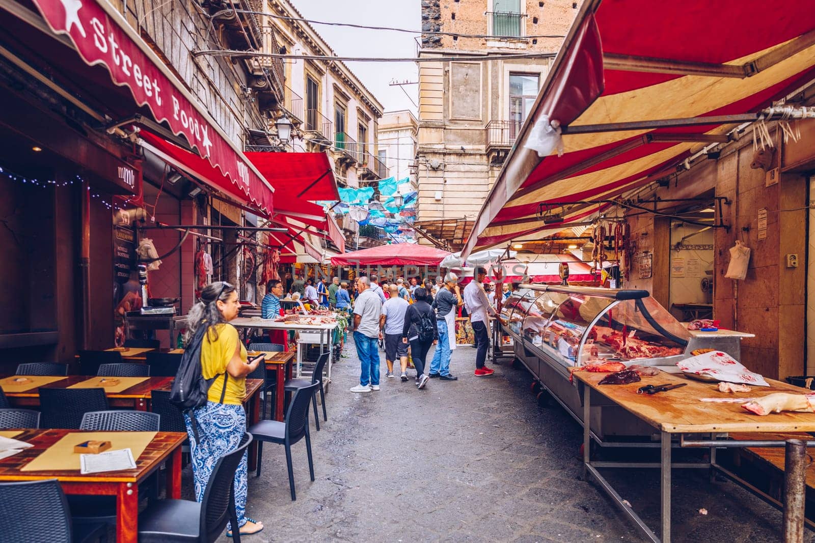 Catania, Italy - November 1, 2019: Seafood at fish market in Catania, Sicily, Italy. Fresh fish at the fish market in the old Town of Catania in the province of Sicily in Italy. 