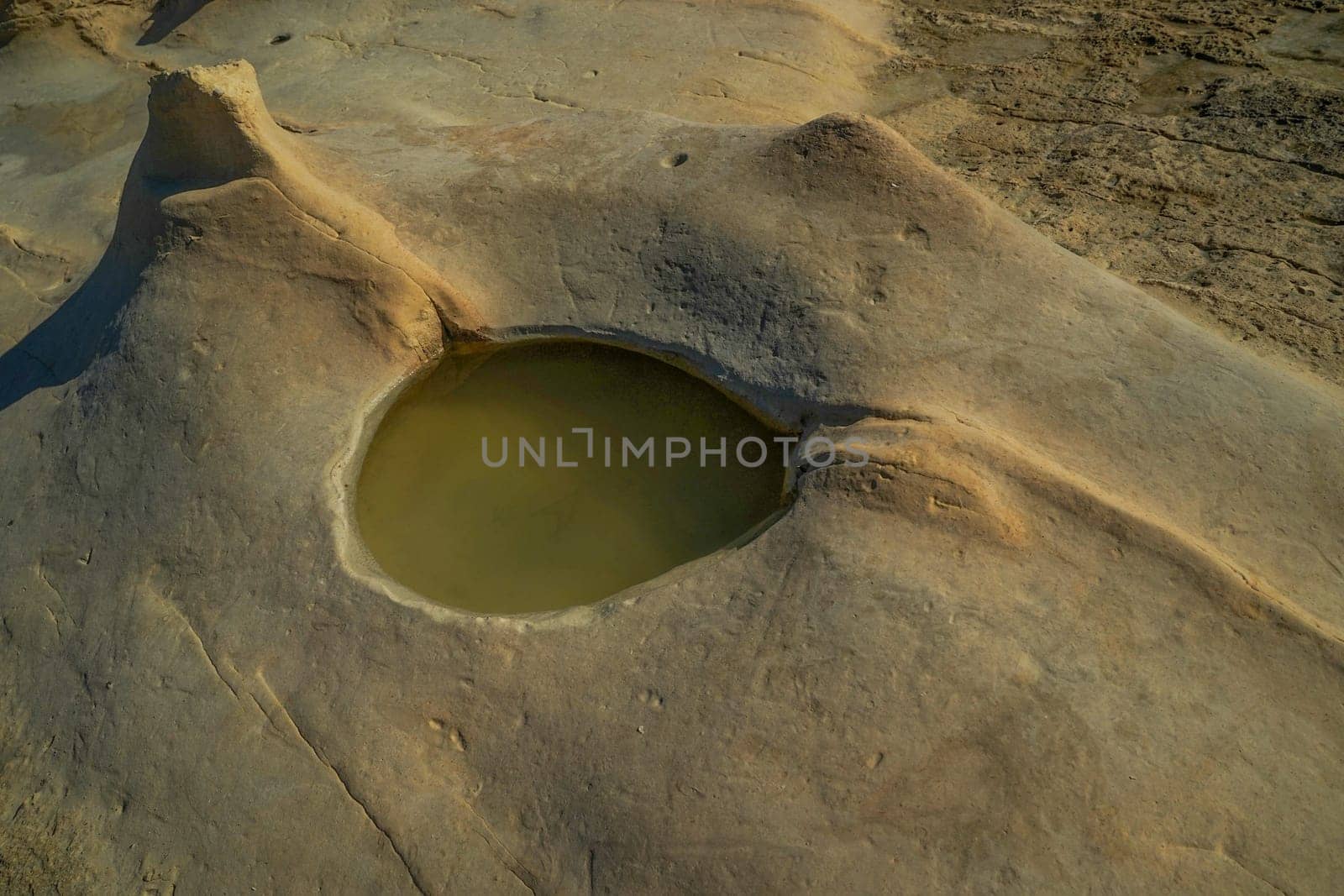 saint peter pools Malta rock formation hole on rocks by AndreaIzzotti