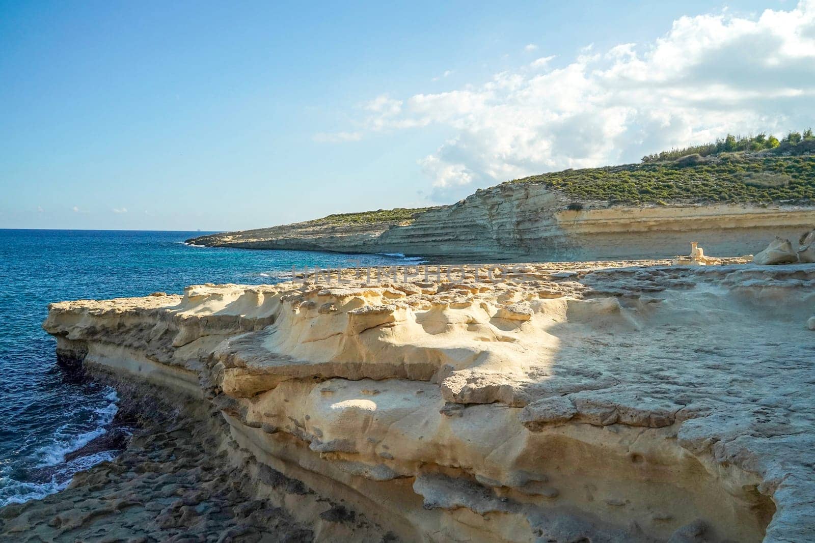 saint peter pools Malta rock formation hole on rocks by AndreaIzzotti