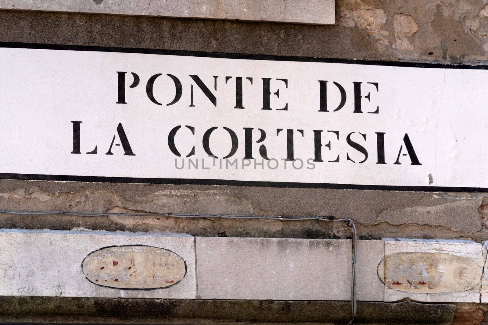 Venice "ponte della cortesia" english translation "courtesy bridge" sign by AndreaIzzotti