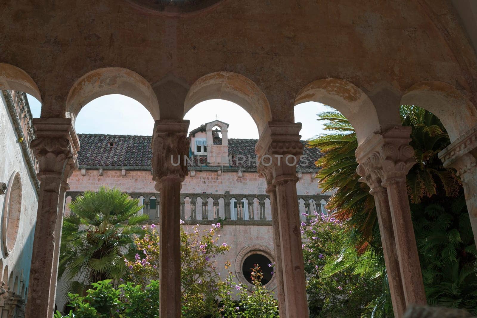 Dubrovnik, Croatia-September 14, 2023: 13th Century Franciscan Monastery, with a view of the bell tower