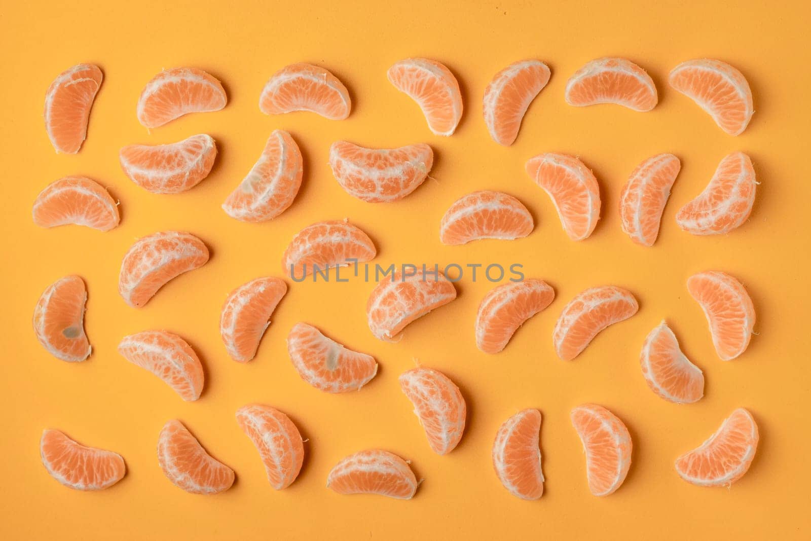 Collection of tangerine lobules, citrus food background with yellow color