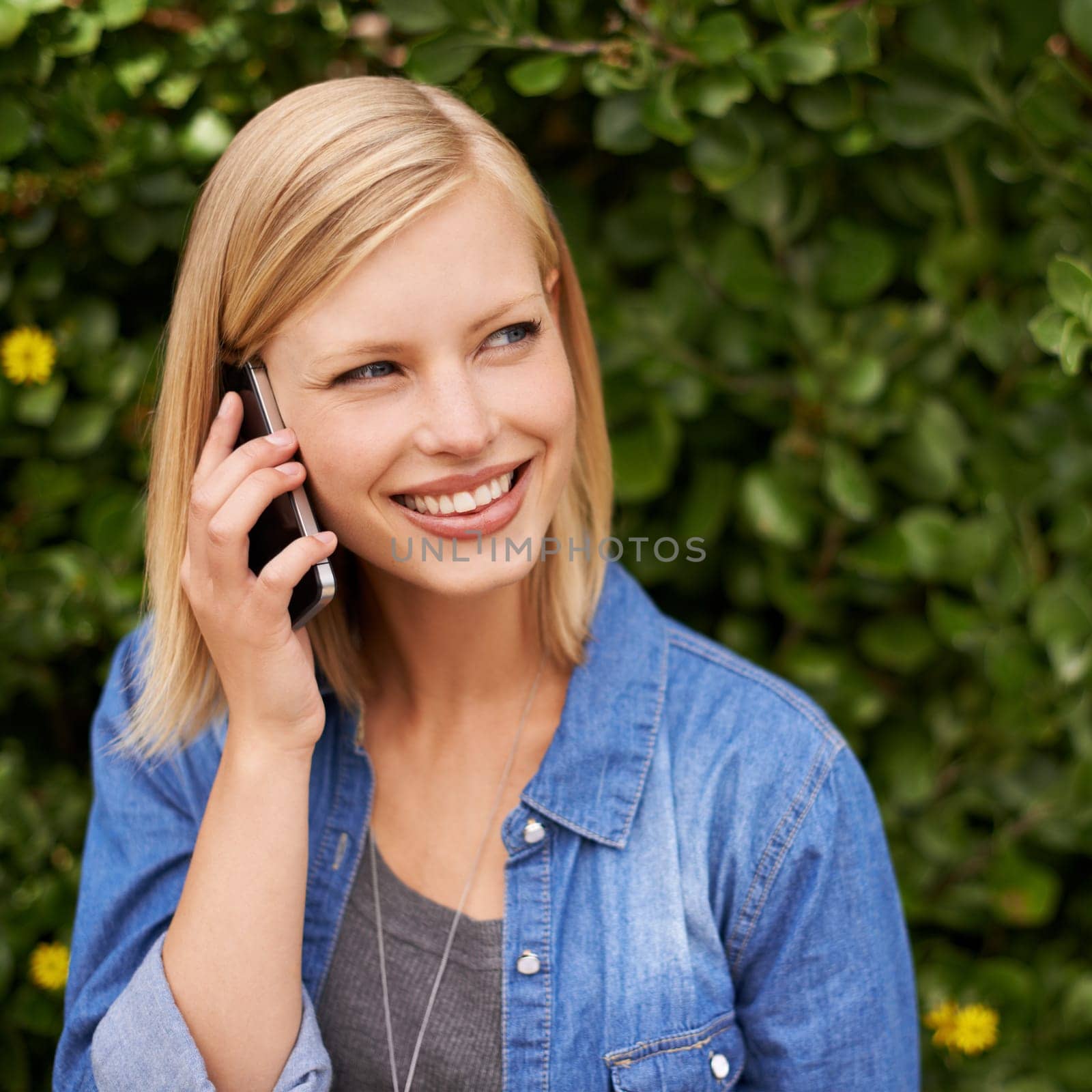 Phone call, smile and happy woman relax in a park with online conversation, listening or chat. Smartphone, hello or lady person in nature with web communication for taxi, chauffeur or commute service.