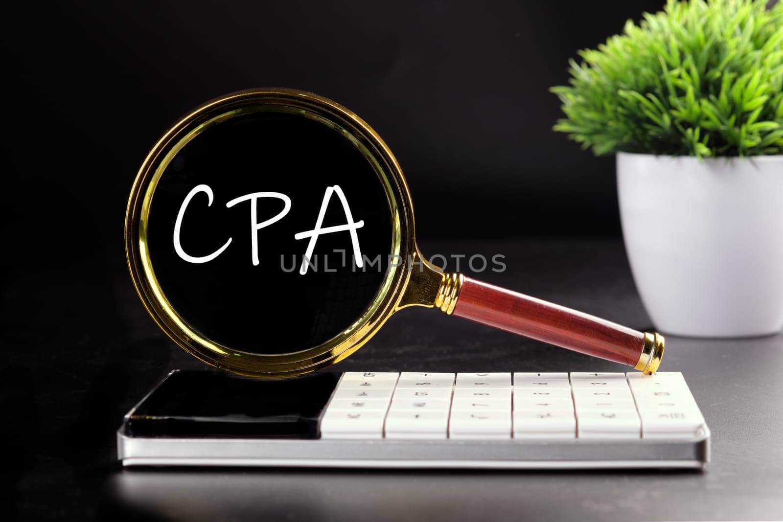 CPA, Certified Public Accountant or Cost per Action text seen with a magnifying glass on a black background