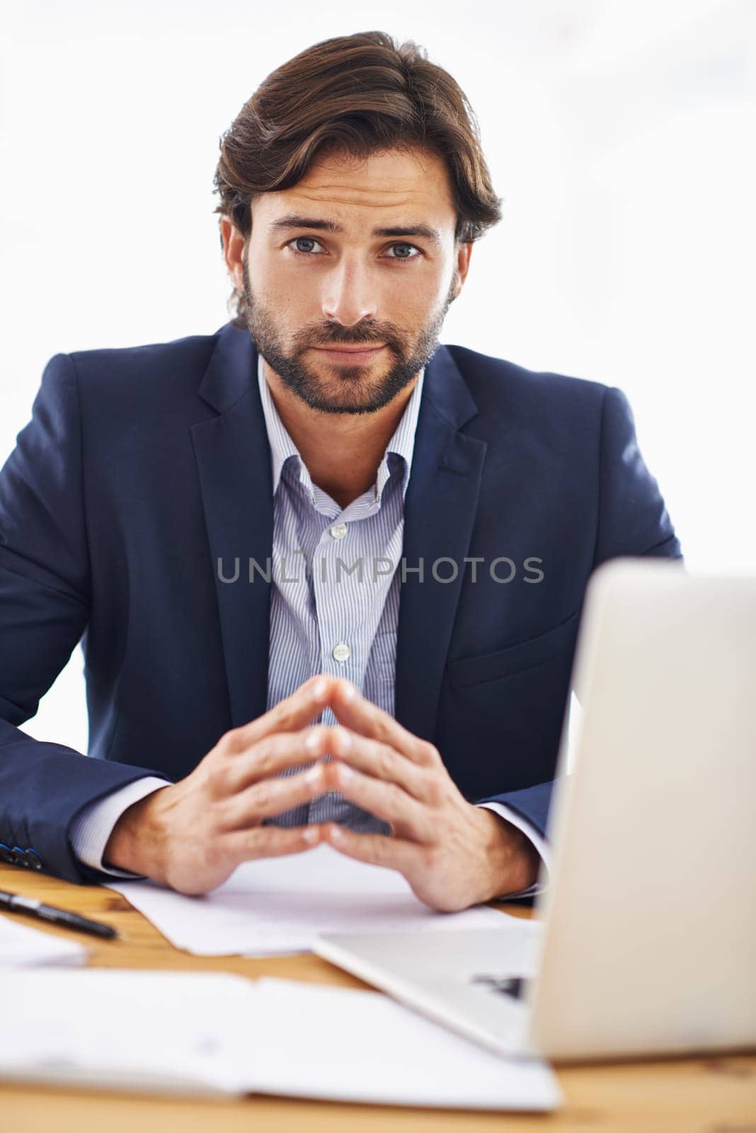 Investor, portrait and businessman on laptop in office with project and research on stocks. Investment, review and planning on computer with email, communication or analysis of information on website by YuriArcurs