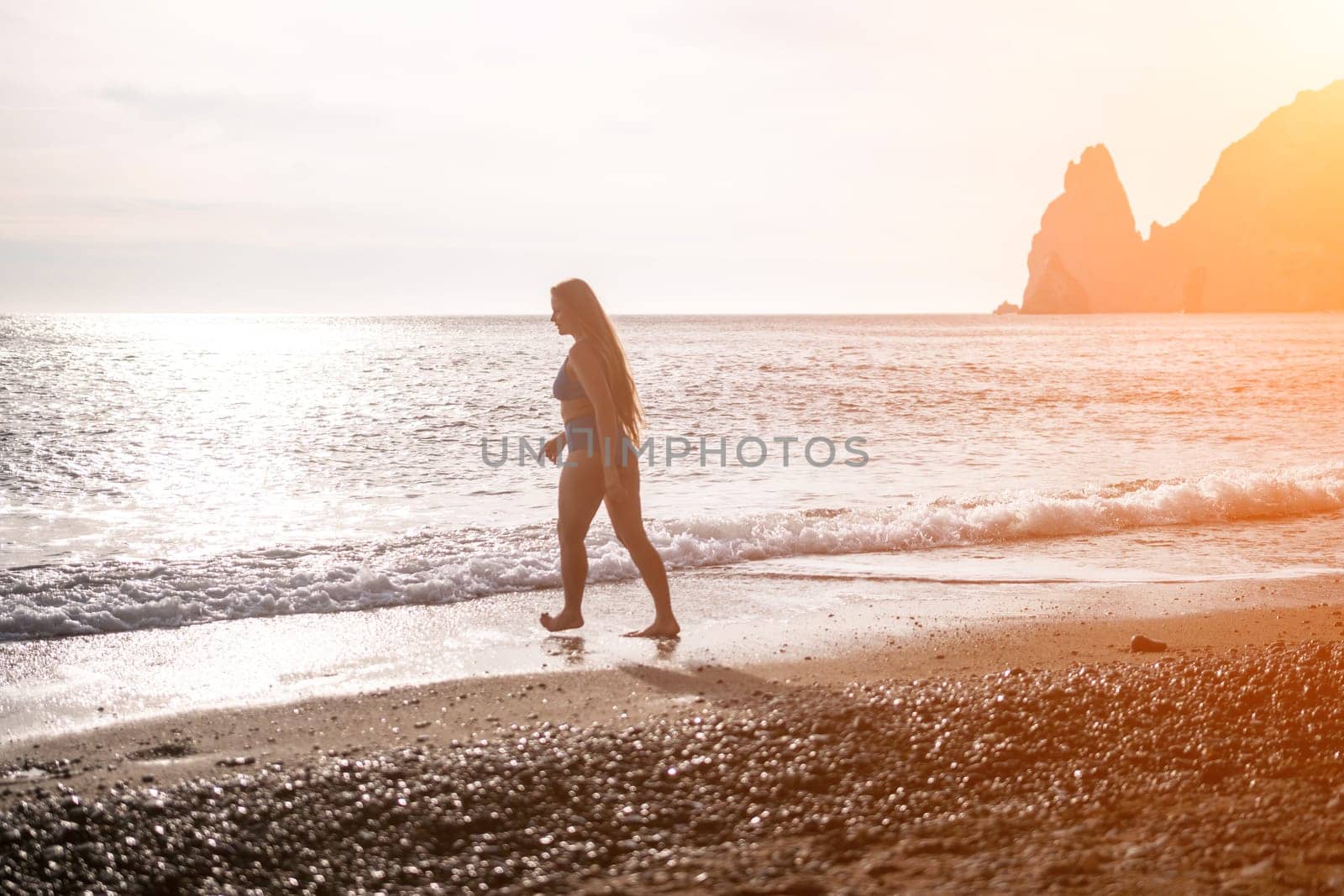 Running woman. Female runner jogging during the sunrise on beach. Woman Runner feet running on the beach at sunrise. woman fitness sunrise jog workout wellness concept.