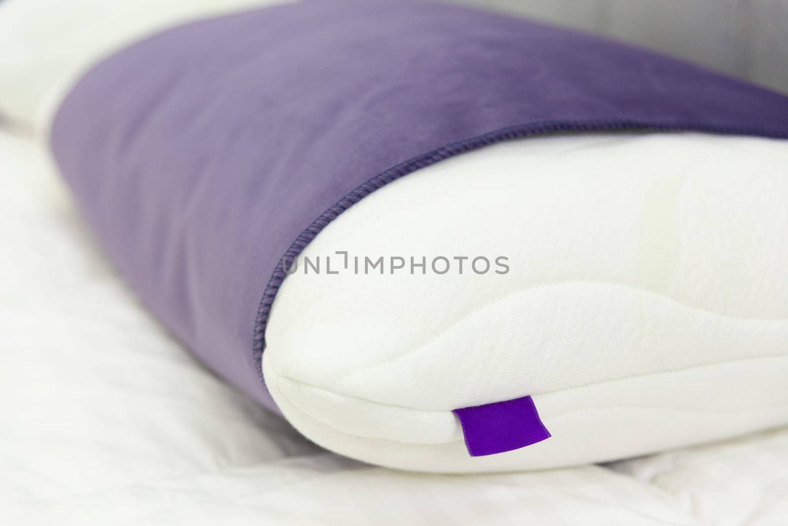 Modern snow-white pillow in purple cover by BY-_-BY