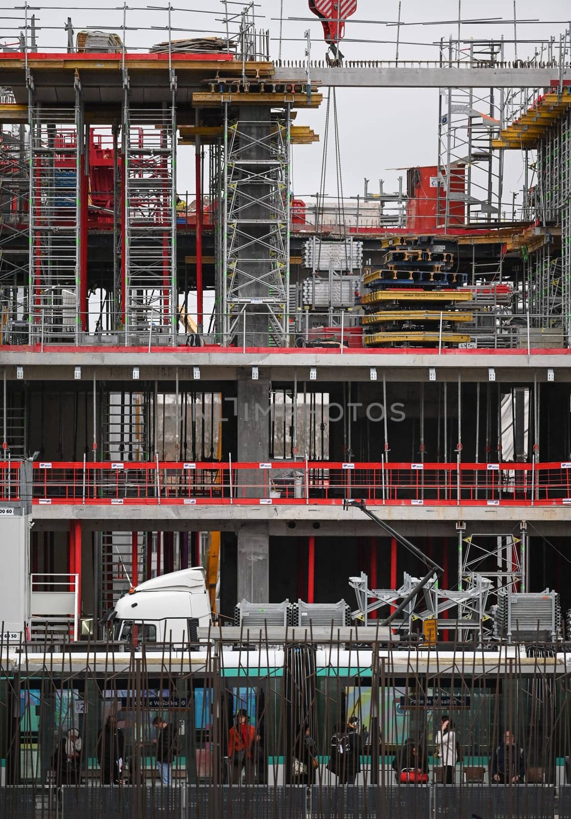 Paris, France, February 2024, Construction site with tower crane, House and buildings construction, Hotel apartments construction, Housing renovation, real estate, Crane on formwork in Built environment, Cranes on pouring concrete. High quality photo
