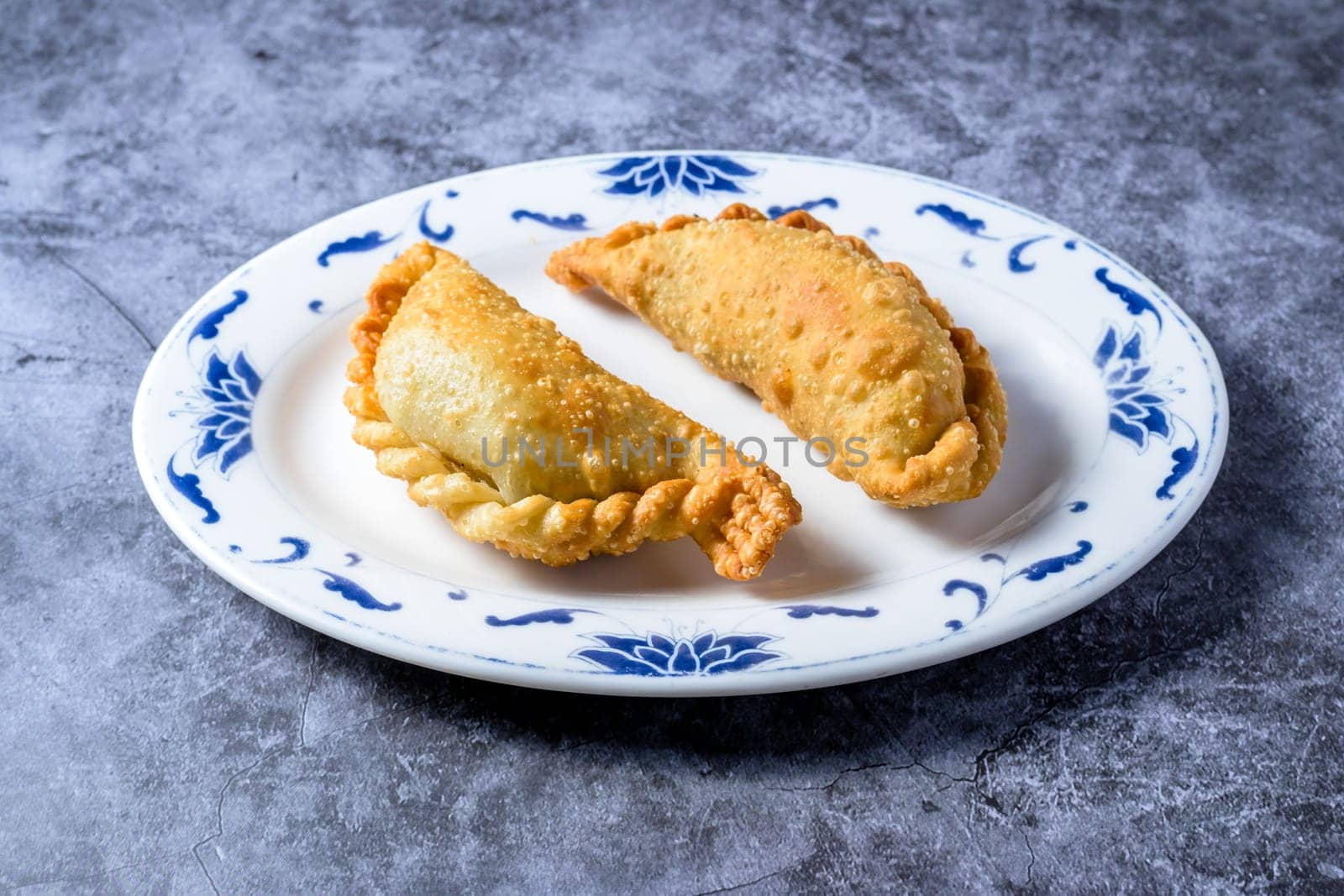 Traditional Latin American baked beef empanadas.