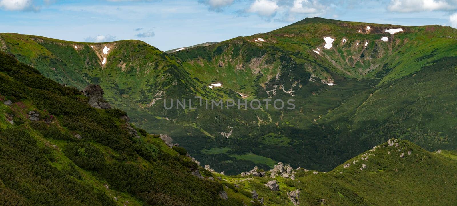 Mountain landscape, panoramic view of Mount Menchul in the Ukrainian Carpathians, summer in the Carpathian Mountains.