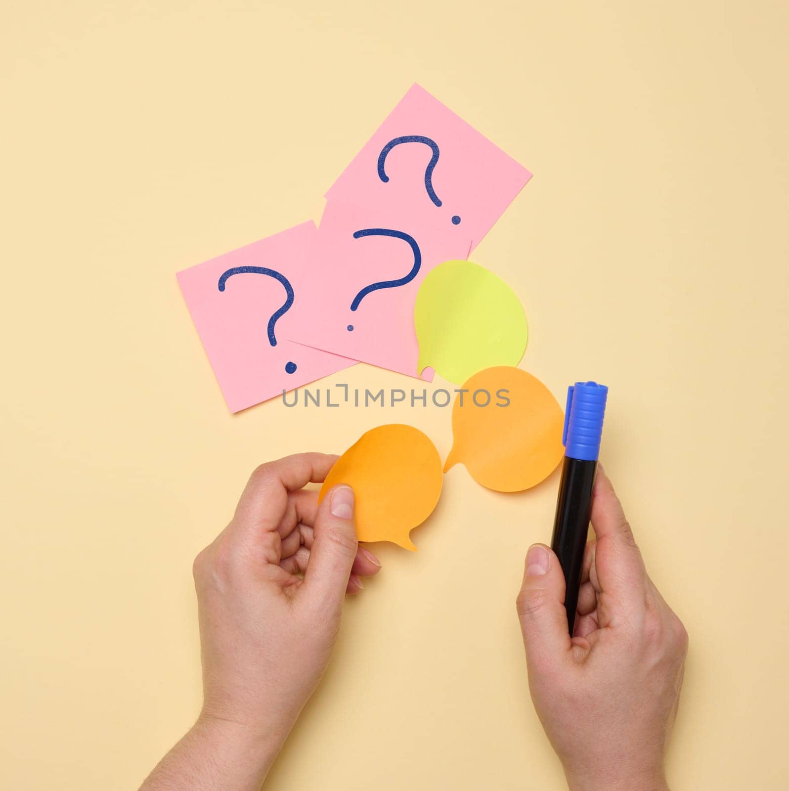 Paper stickers with question marks on a yellow background by ndanko