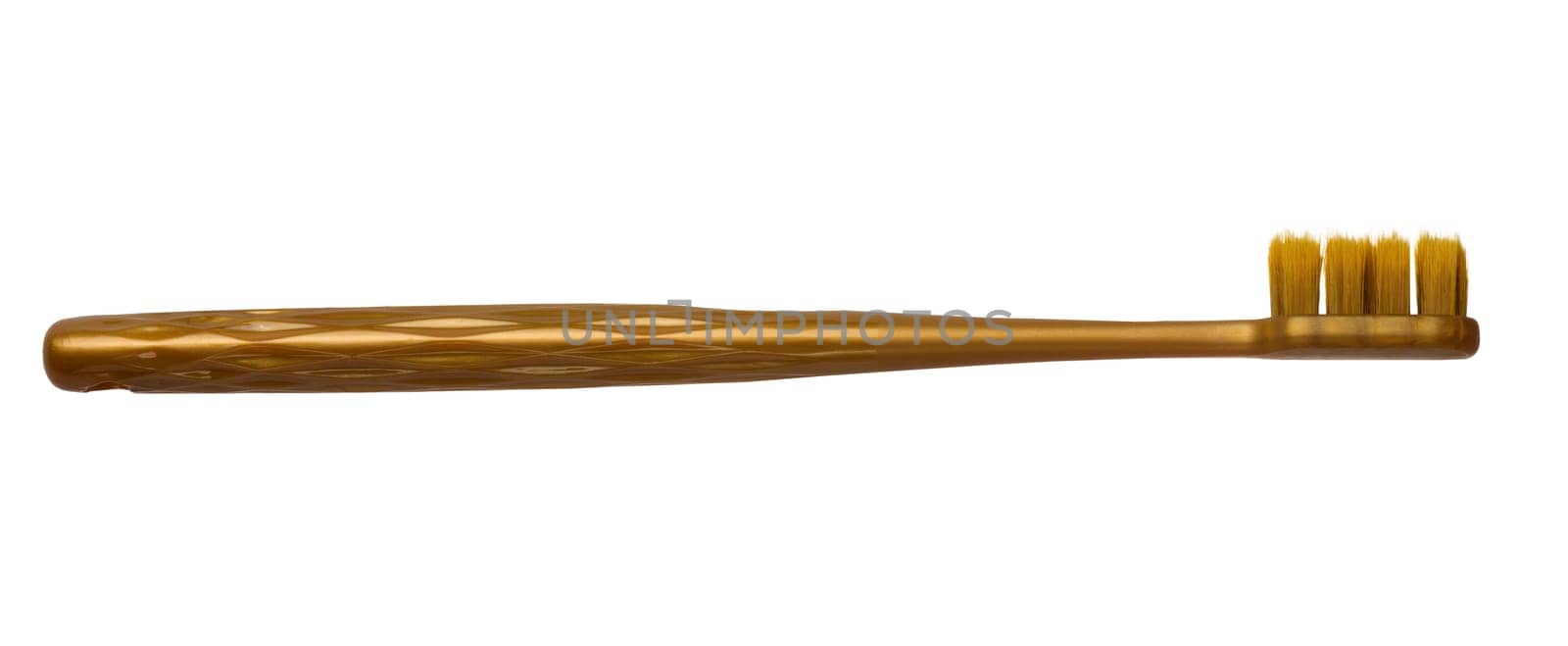 Brown plastic toothbrush on isolated background, top view