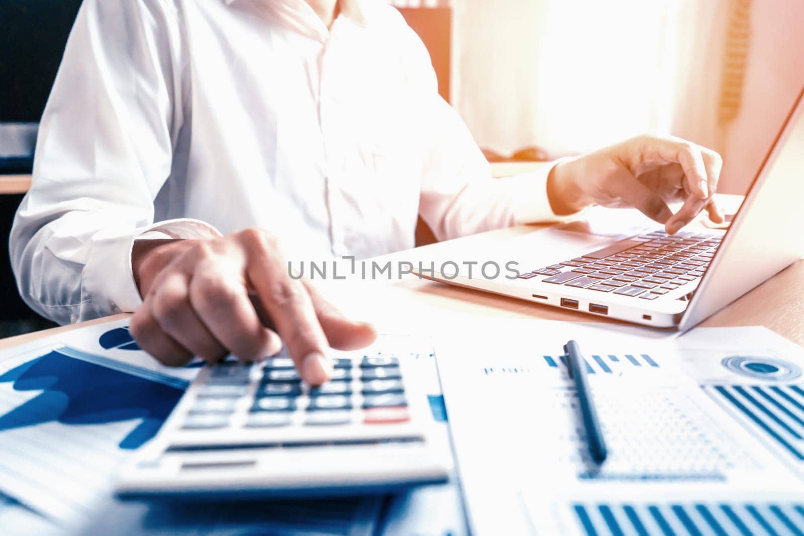 Businessman analyze data of stock market research. uds by biancoblue