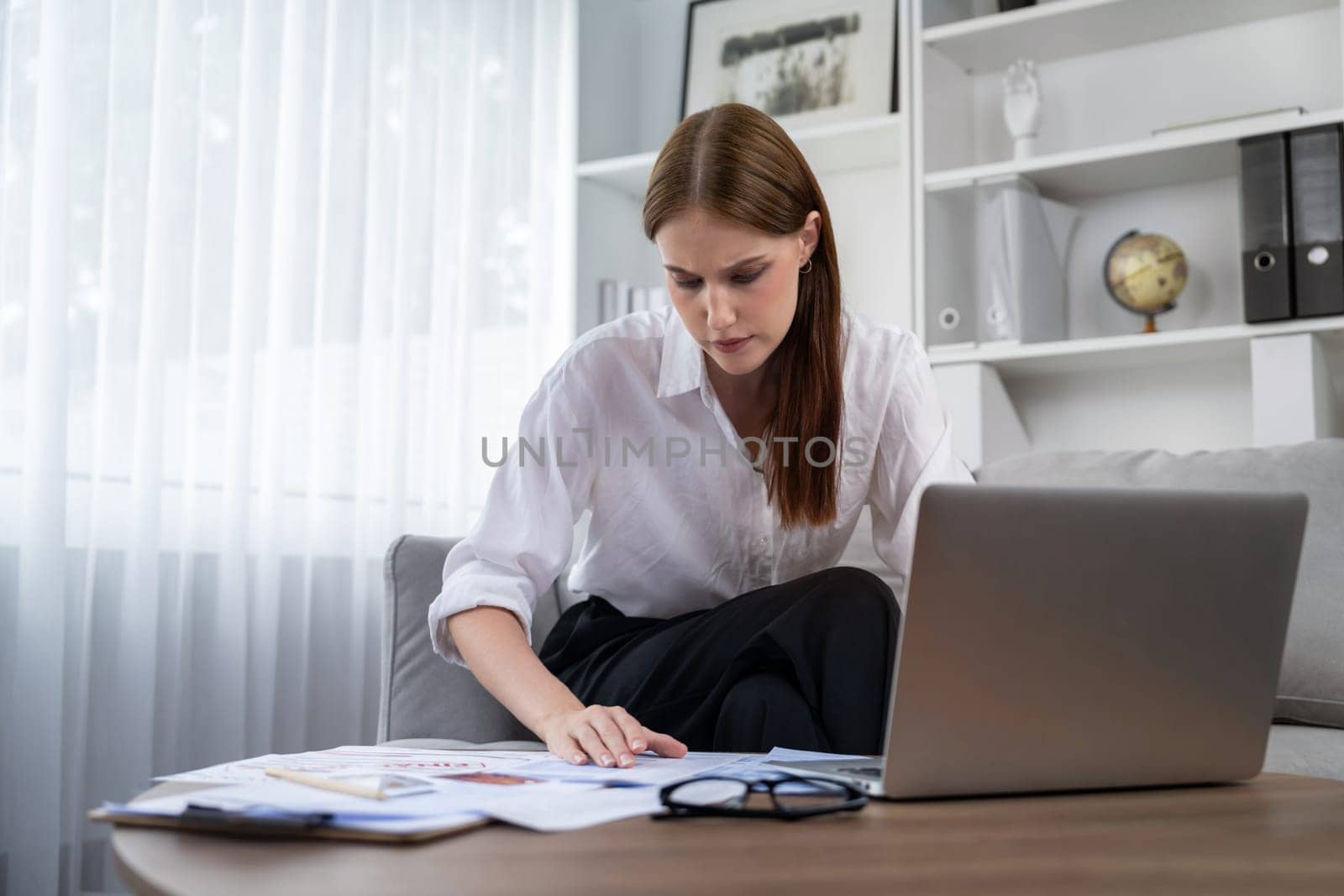 Stressed young woman has financial problems credit card debt to pay utmost by biancoblue