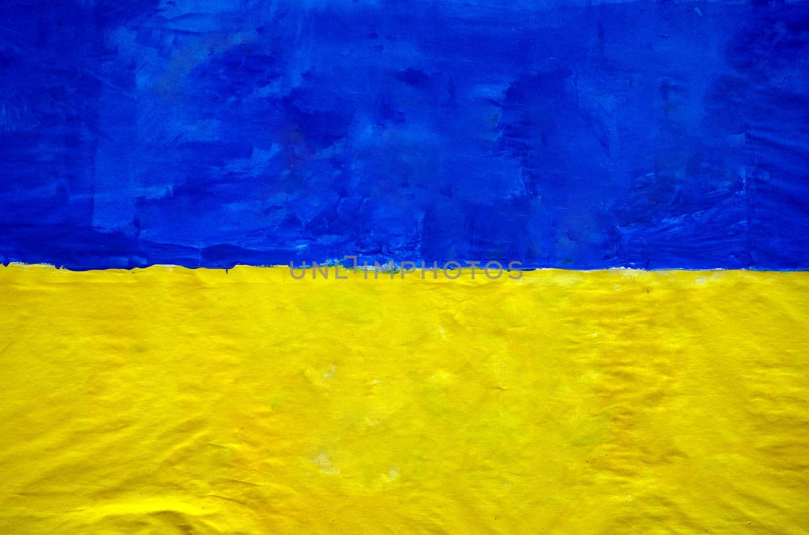 Stop the war peace painting on building wall ukraine flag blue and yellow