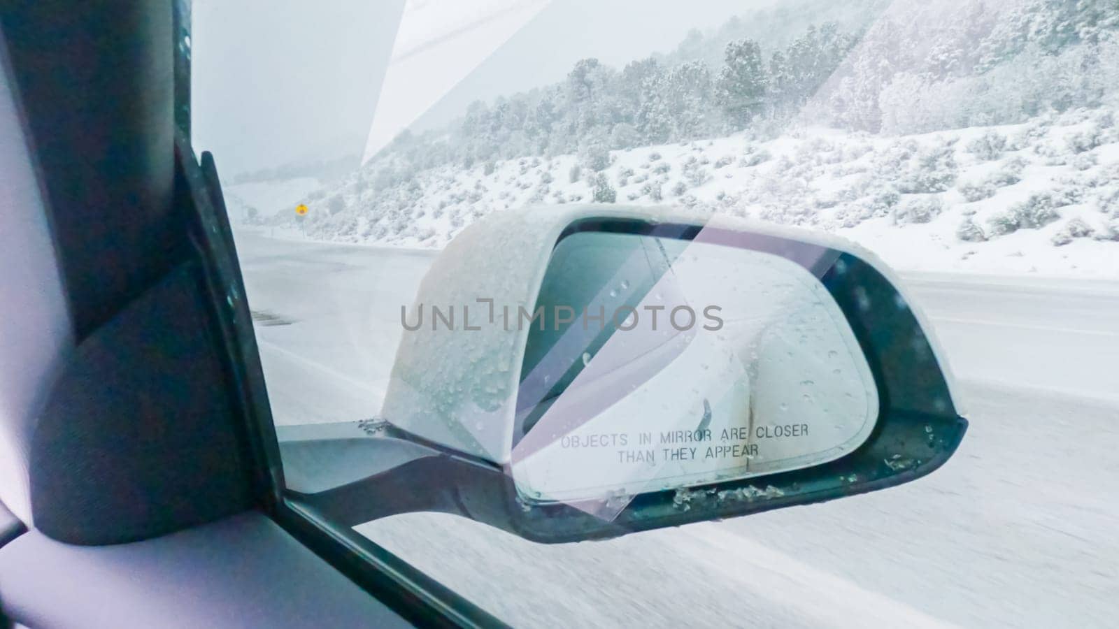 Braving a Winter Storm Driving Through Western Colorado by arinahabich