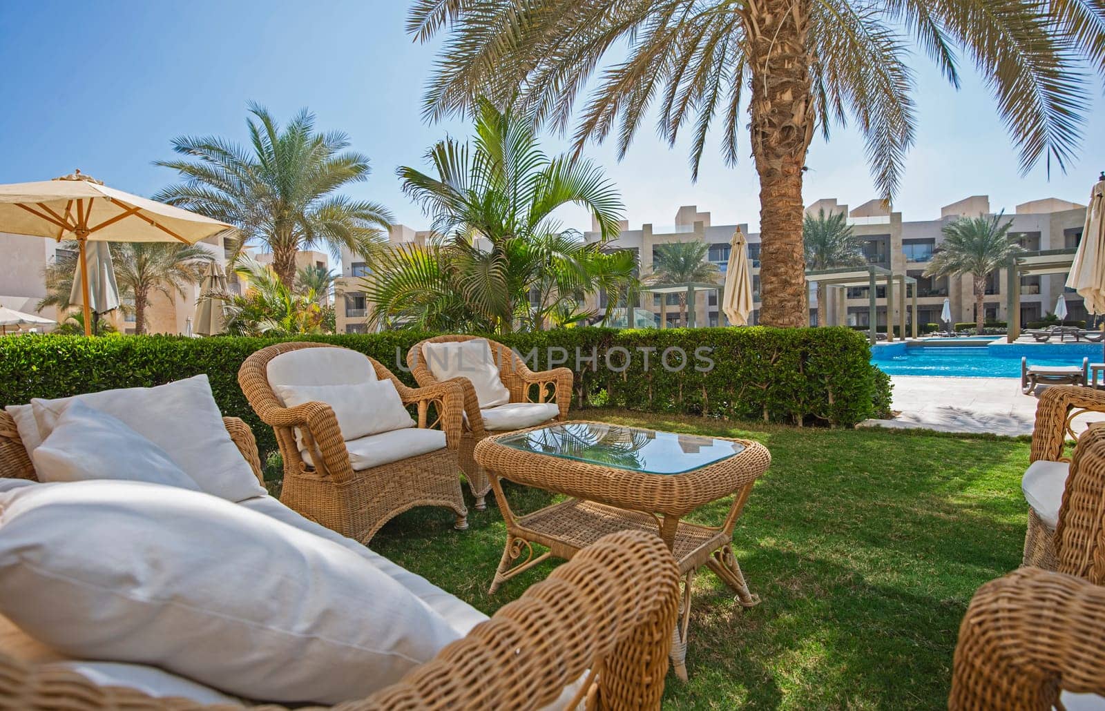 Terrace garden with chairs in tropical luxury apartment resort by paulvinten