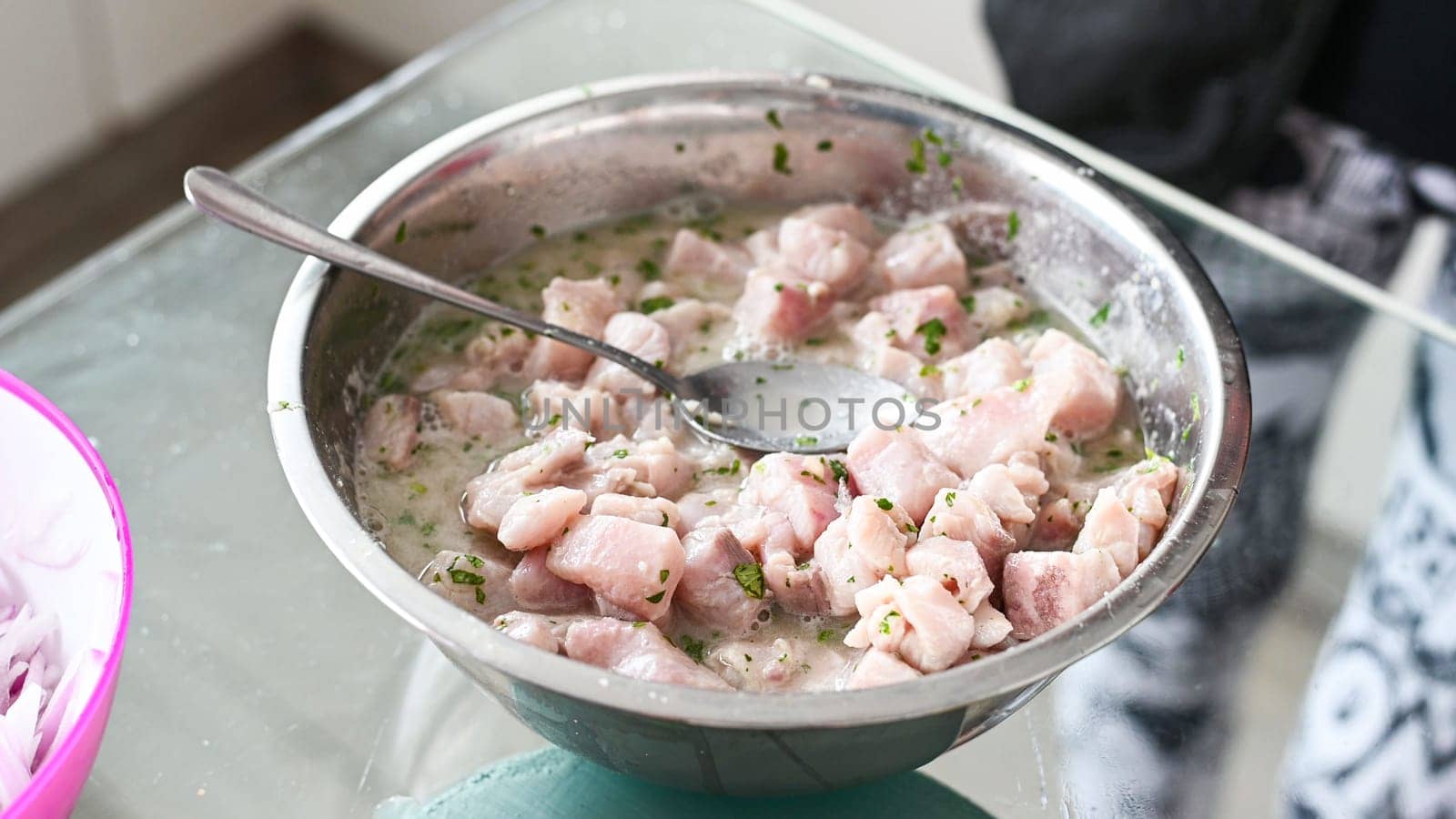 Peruvian food ceviche. 6 Preparation of the ceviche, finally pou by Peruphotoart