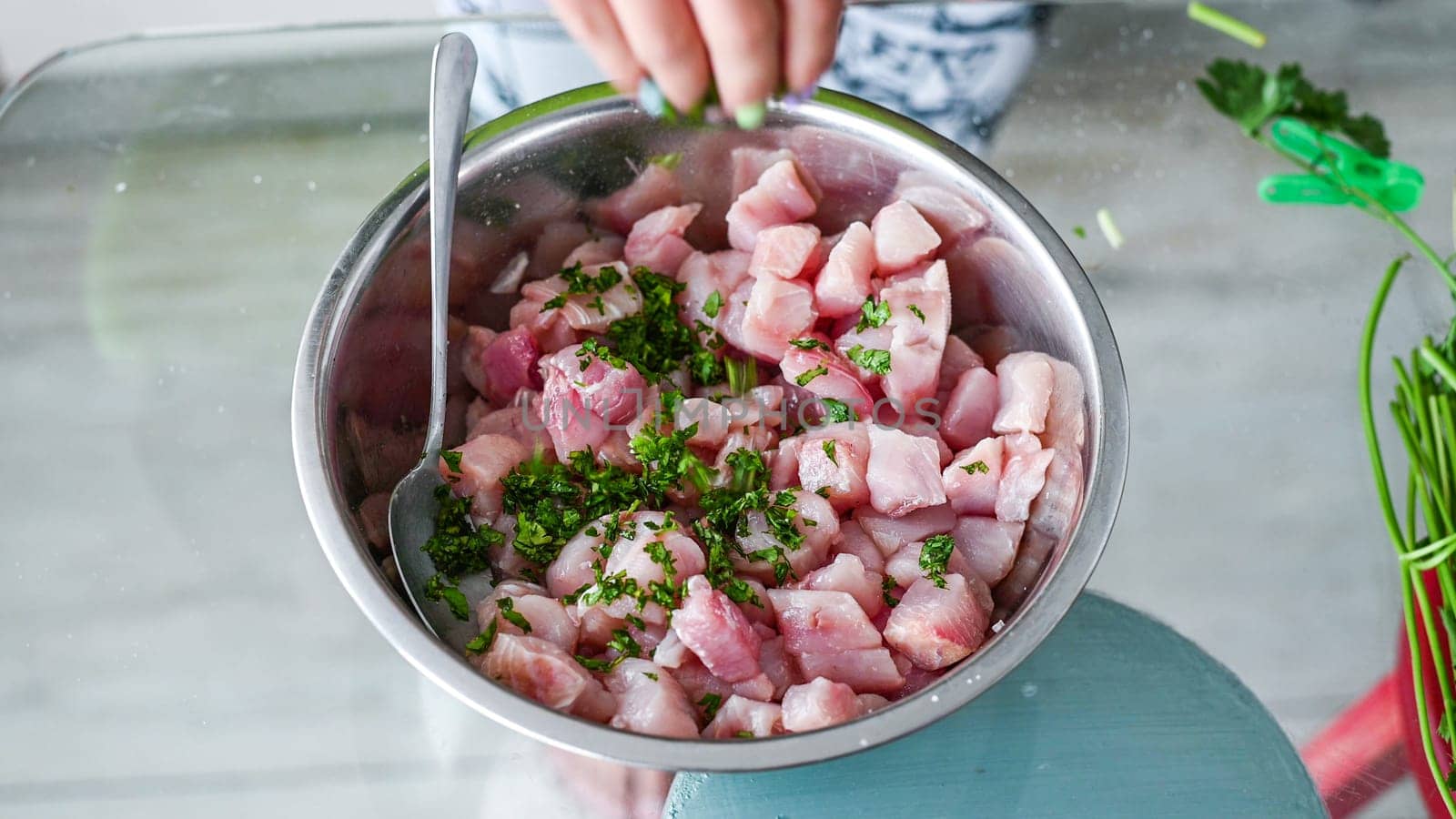Peruvian food ceviche. 3 Preparation of ceviche, stirring the seasonings with the coriander. by Peruphotoart