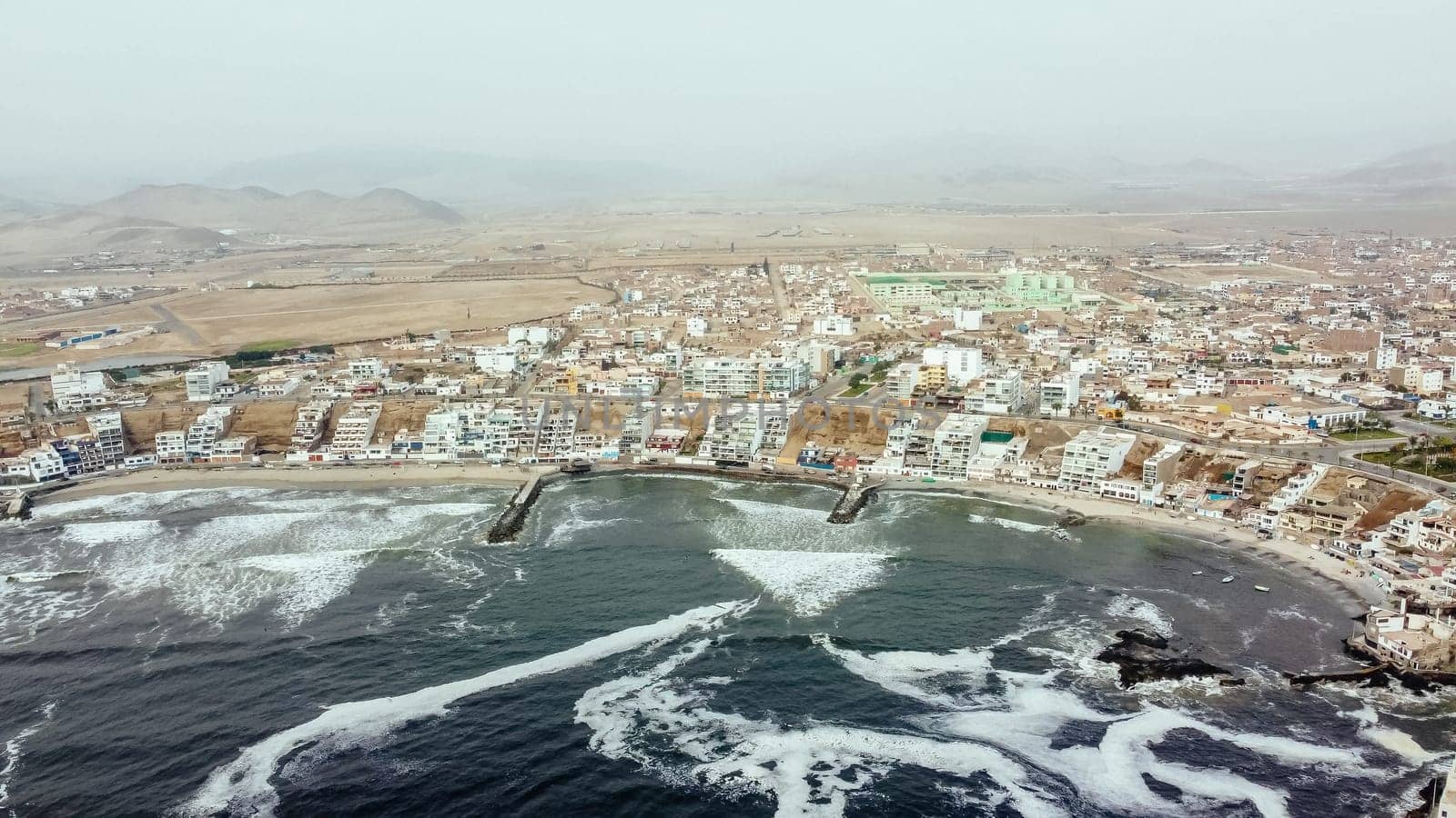 Aerial view with drone of the district of San Bartolo north next by Peruphotoart