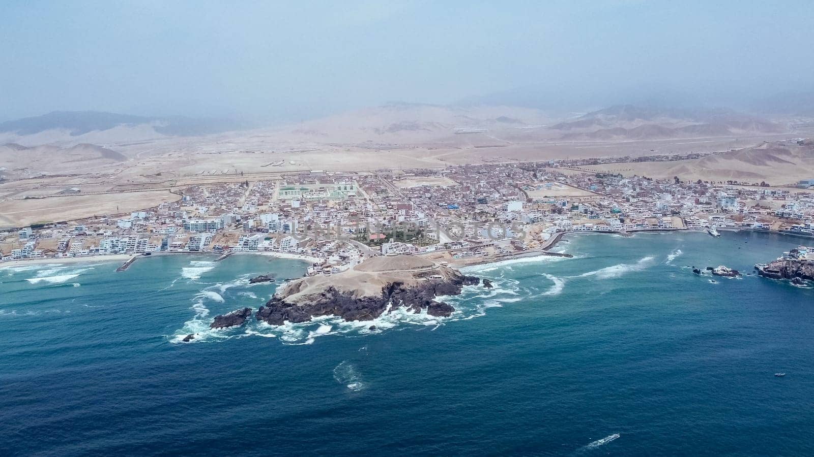Aerial view with drone of the district of San Bartolo next to th by Peruphotoart