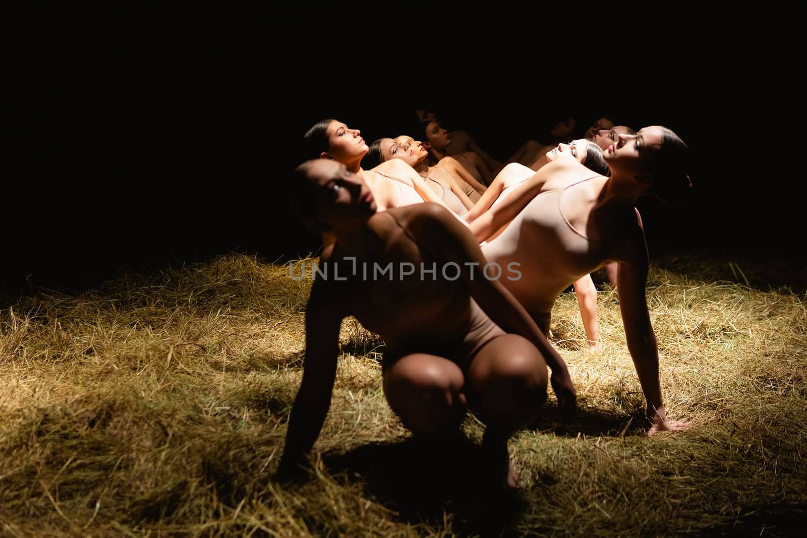 Group of modern ballet dancers. Contemporary art. Young flexible athletic men and women. by sarymsakov