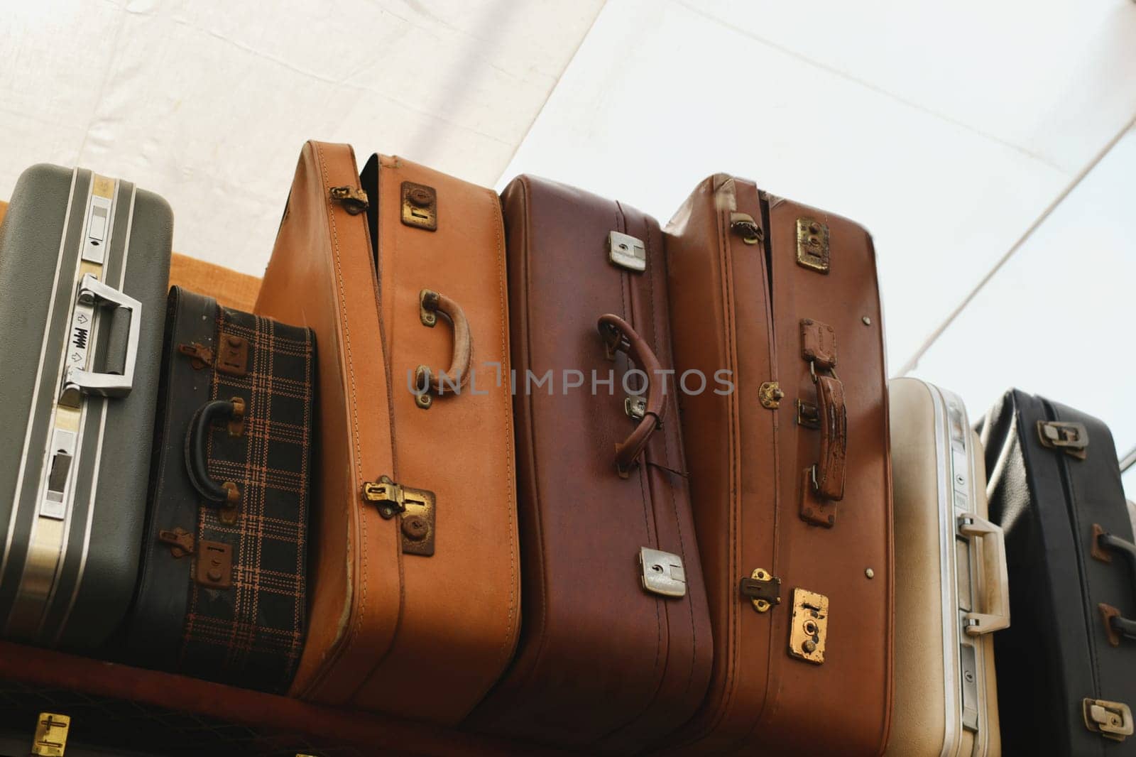 Vintage antique French suitcases at a flea market by Godi