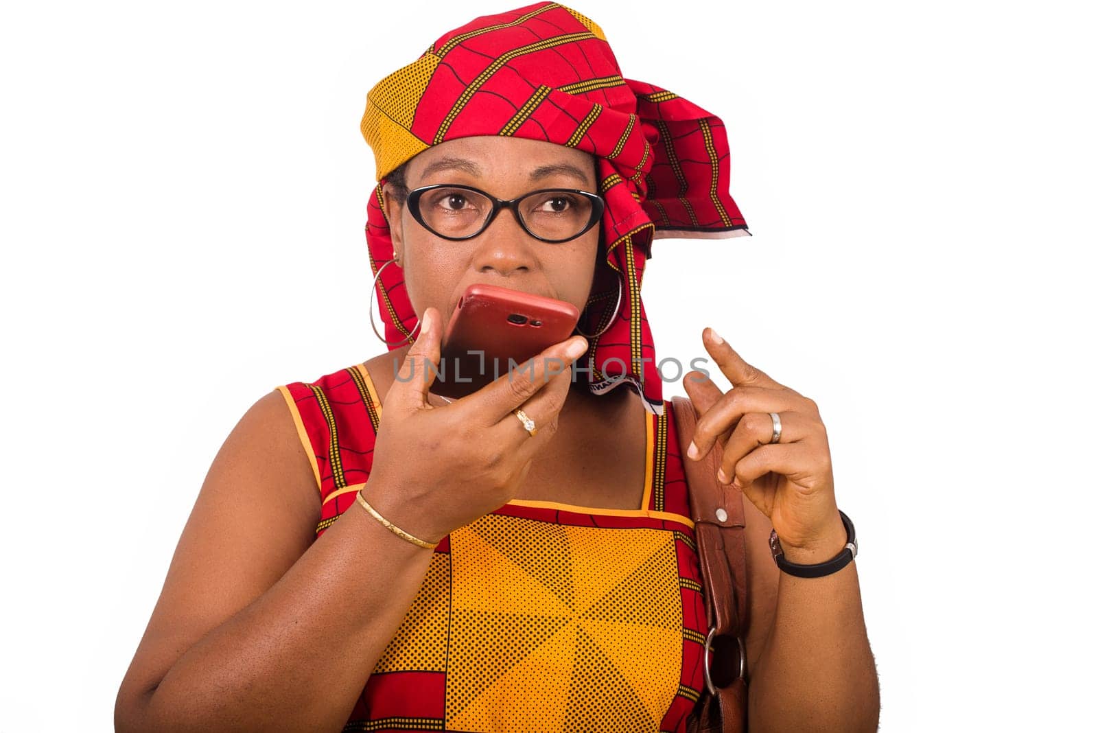 mature woman in loincloth standing on white background communicating to mobile phone.