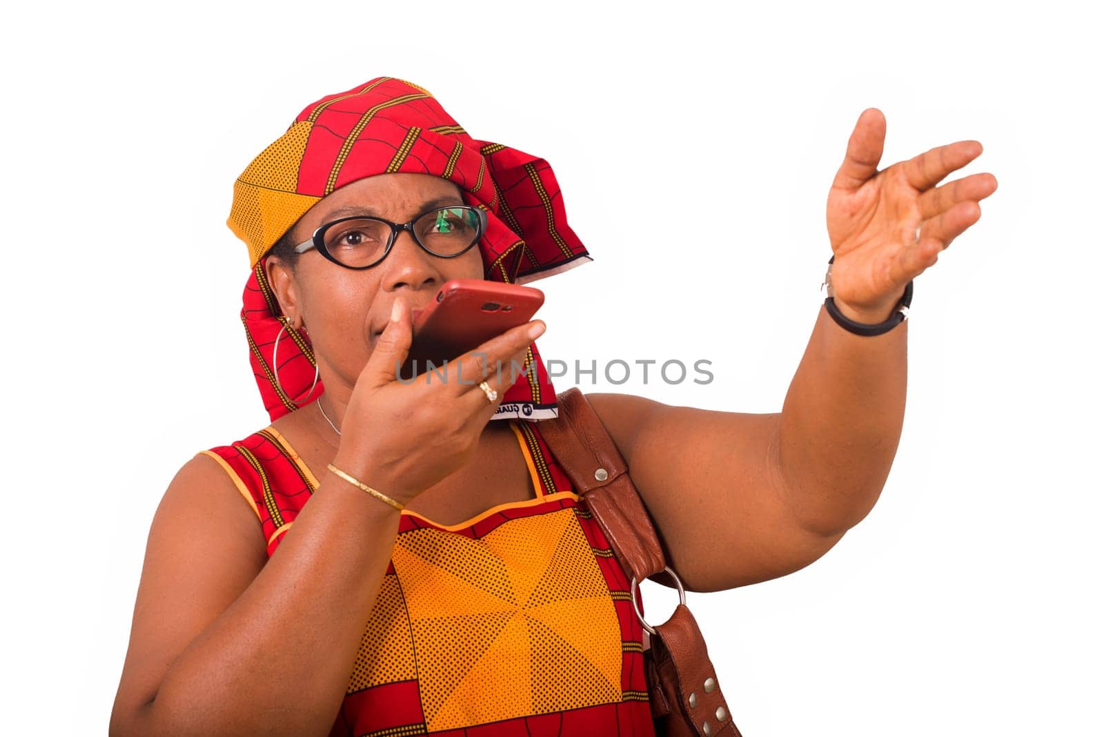 mature woman in loincloth standing on white background communicating to mobile phone.
