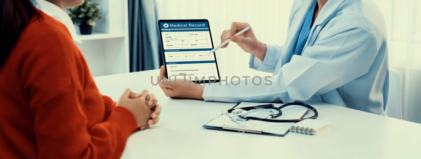 Laptop display medical report or diagnostic result of patient health on blurred background of doctor's appointment in hospital. Medical consultation and healthcare treatment. Panorama Rigid
