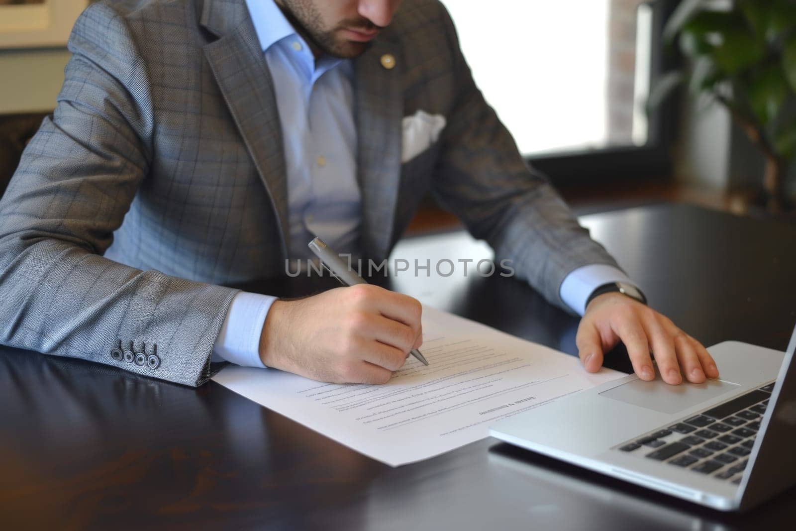 Close up hands of Businessman signing a document on desk, office background, Business concept.