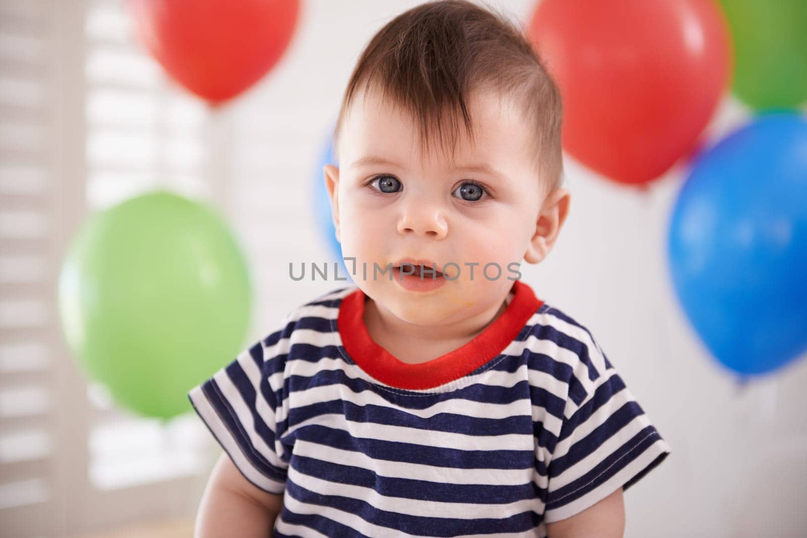Baby, portrait and balloons or birthday party celebration on special day or decoration, inflatable or development. Childhood, boy and face at home or milestone event or growth youth, relax or weekend.