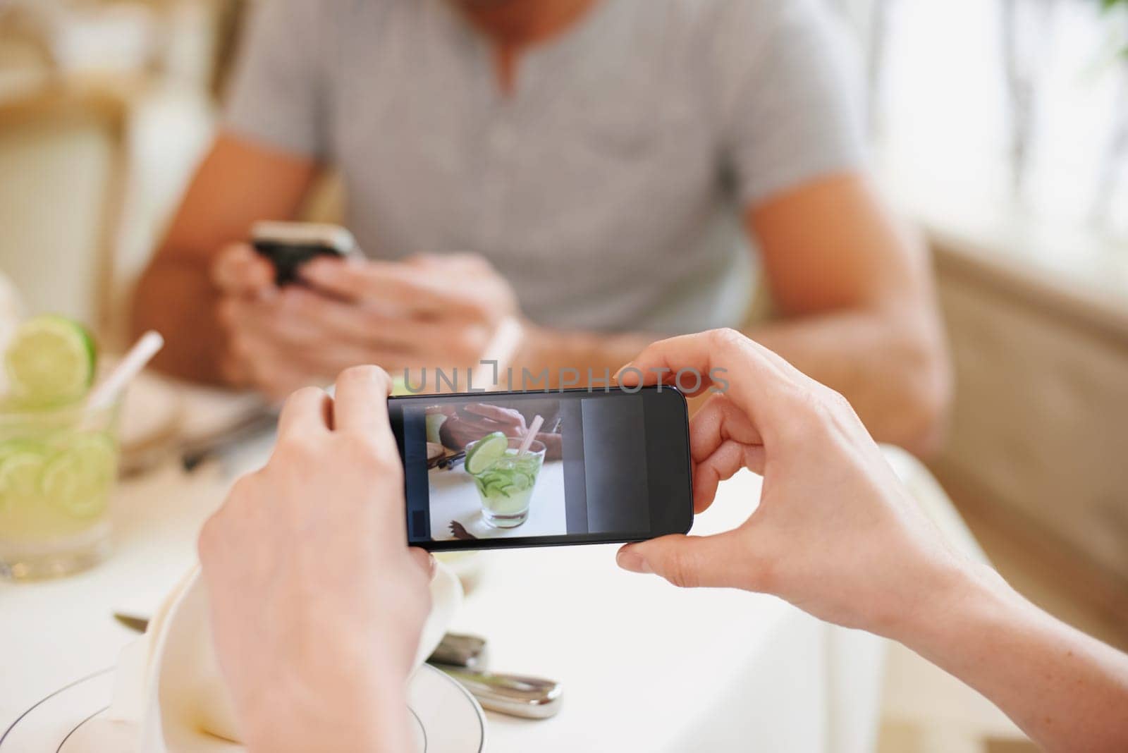 Cafe, picture and couple with cellphone, screen and connection with Valentines day and photograph. Date, man and woman with smartphone and digital app for memory and romance with restaurant or luxury.