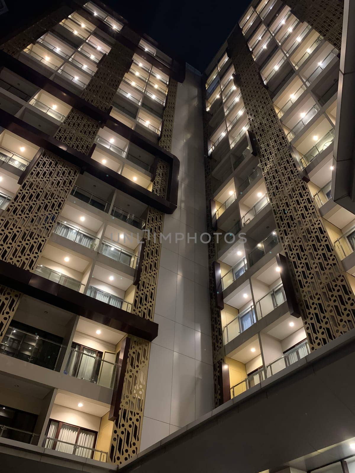 Tall building perspective during night time, business background, business template background, presentation background for your creative content creation