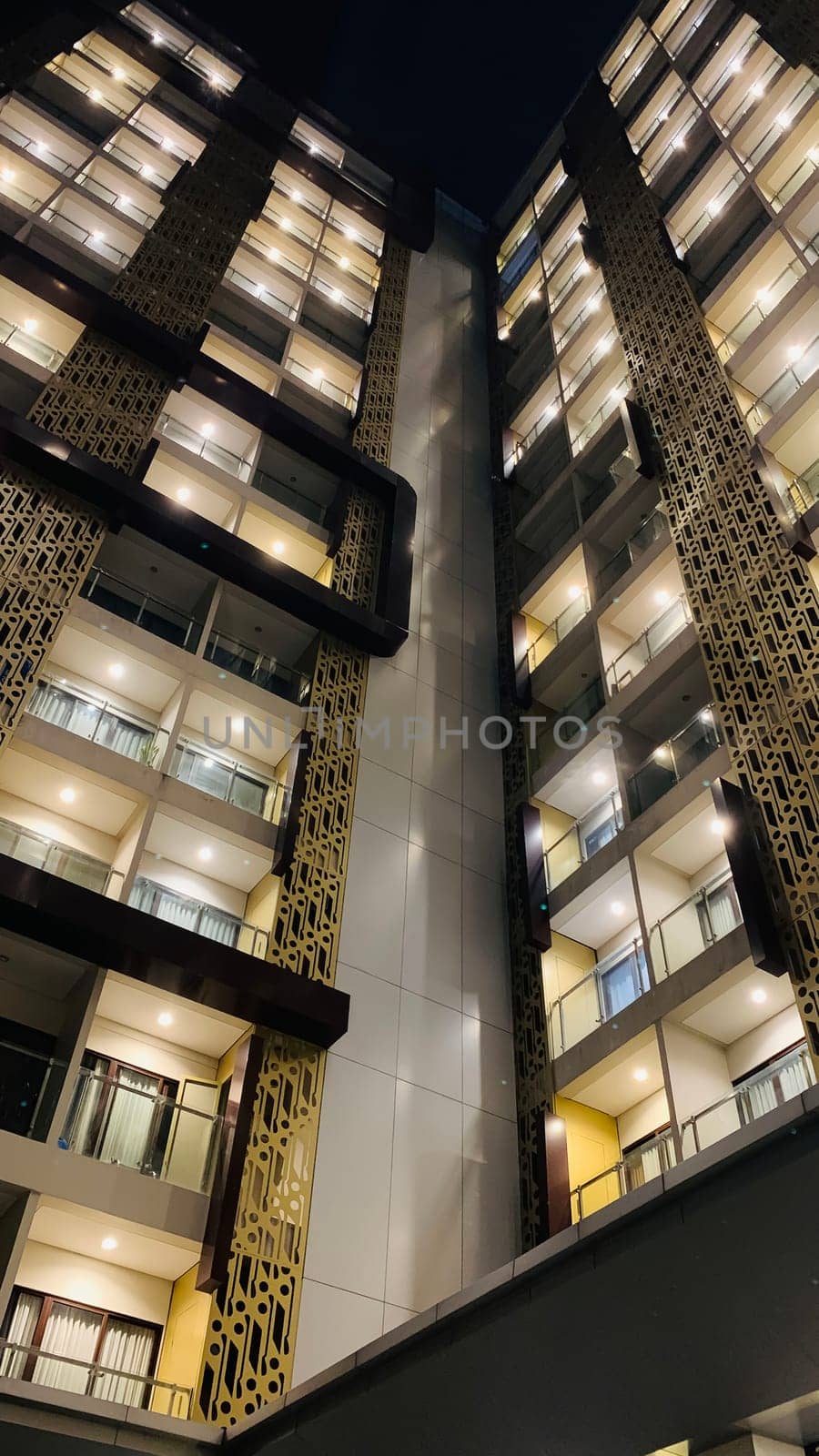 Tall building perspective during night time, business background, business template background, presentation background for your creative content creation