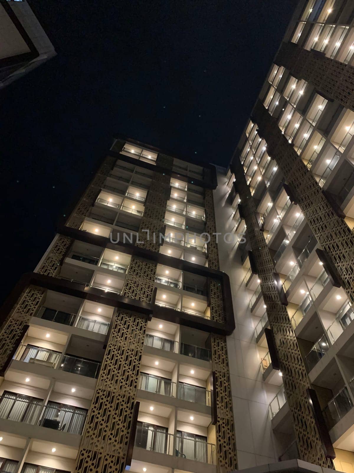 Tall building perspective during night time, business background, business template background, presentation background for your creative content creation